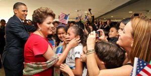 Photo: Roberto Stuckert/Filho/PR -- President Barack Obama and Brazilian President Dilma Rousseff greet school children at Planalto Palace In Brasilia March 19, 2011