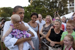 Photo: Pete Souza/White House -- To the surprise of onlookers, President Obama soothed a crying baby at a congressional picnic at the White House June 15, 2011