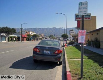 Photo: FLLewis/Media City G -- Parking restriction signs are up along a stretch of Olive Avenue for the upcoming Burbank on Parade April 24, 2014 