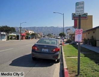 Photo: FLLewis/Media City G -- Parking restriction signs are up along a stretch of Olive Avenue for the upcoming Burbank on Parade April 24, 2014