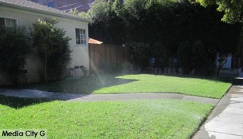 Photo: FLLewis/Media City G -- A green lawn gets watered on South Keystone Street in Burbank July 24, 2014