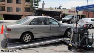 Photo: FLLewis/ Media City G -- Vehicle emissions are checked by BAR crew on West Olive Avenue in Burbank July 28, 2014