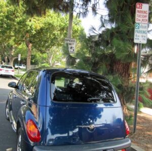 Photo: FLLewis/ Media city G -- Two hour parking restriction signs are posted on the 1000 block of North Kenwood Street in Burbank August 9, 2014