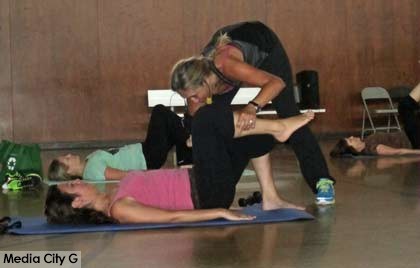 Photo: FLLewis/Media City G -- Michelle Wilson made a correction to a client in the Pilates class at the Verdugo Park Recreation Center in Burbank July 2, 2014