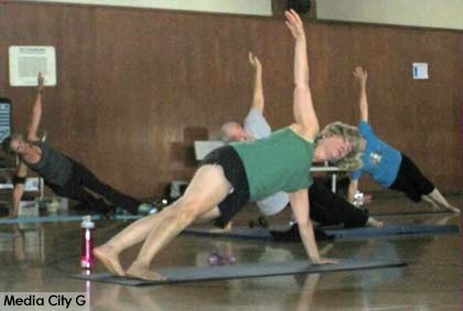 Photo: FLLewis/ Media City G -- Pilates class performed a side plank move at the Verdugo Recreation Center in Burbank July 2, 2014