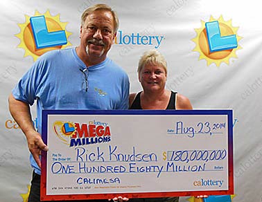 Photo courtesy Mega Millions -- Retired Riverside County man, Rick Knudsen and his wife, Lorie, claimed a $180 million lottery jackpot September 2, 2014