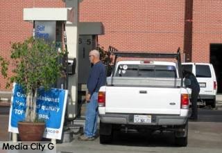 Photo: FLLewis / Media City G -- Pumping gas at the Arco station 3701 West Magnolia Blvd. Burbank where regular is selling for $2.99 a gallon November 13, 2014