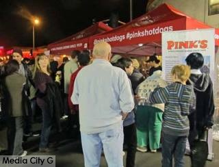 Photo: FLLewis / Media City G -- Crowds gathered at the Pink's tent for free hotdogs at Toluca Lake Open House December 5, 2014