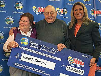 Photo courtesy Mega Millions -- (l-r) Carol and Harold Diamond with New York lottery official Yolanda Vega January 12, 2015