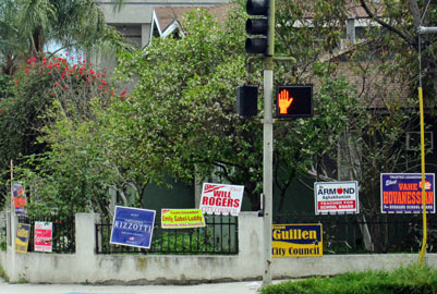 Photo: FLLewis / Media City G -- Numerous political signs line a fence of a resident at Verdugo Avenue and Buena Vista Street in Burbank February 23, 2015