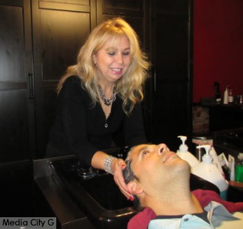 Photo: FLLewis / Media City G -- Stylist and owner Diana Azarian washed client's hair at 1920s Hair and Nail Bar in Burbank March 5, 2015