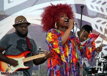 Photo: Greg Reyna / Media City G -- Female singer belts out a tune at a street fair in New Orleans April 2015