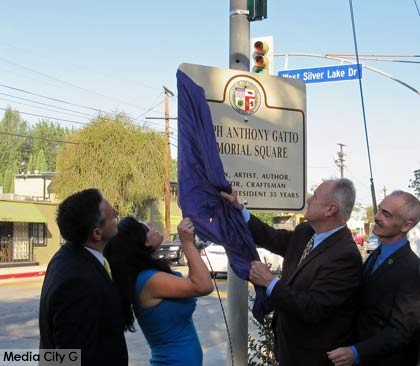 Photo: FLLewis / Media City G -- (l-r) Los Angeles Councilman Joe Buscaino, Marianna Gatto, Los Angeles Councilman Tom LaBonge, Los Angeles Councilman Mitch O'Farrell -- The "Joseph Anthony Gatto Memorial Square" sign unveiled today  at West Silver Lake Drive and Rowena Avenue in Silver Lake June 19, 2015