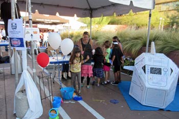 Photo: FLLewis / Media City G -- Woman and children at National Night Out event in BPD parking lot in Downtown Burbank August 4, 2015