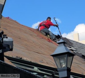Photo: FLLewis / Media City G -- Roofer at work at old location of Elephant Bar in downtown Burbank November 4, 2015