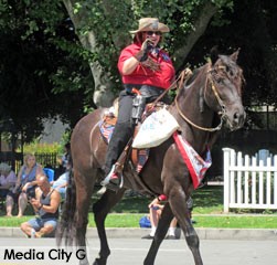 Photo: FL Lewis / Media City G -- Horse and rider in perfect sync along the route of Burbank on Parade April 23, 2016