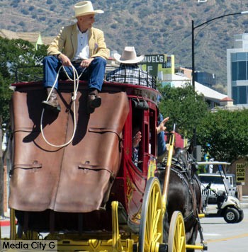 Photo: FLLewis / Media City G - Former TV child star, Johnny Crawford, of "Rifleman" entertained the crowds with rope tricks while riding on top of a stagecoach in Burbank on Parade April 23, 2016