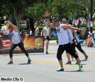 Photo: FLLewis/ Media City G -- OULA Fitness demonstrators bust a move during Burbank on Parade April 23, 2016