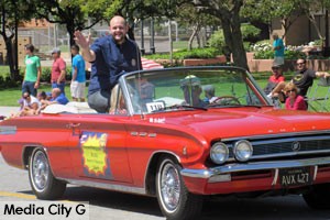 Photo: FLLewis / Media City G -- Burbank School Board member Steve Ferguson waved to the crowds from the back seat of a vintage red convertible in Burbank on Parade April 23, 2016