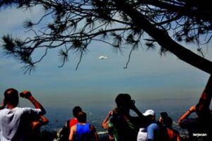 Photo: Terje "Terry" Canavarro/Freelance Photog -- Spectators on Burbank Peak watched Endeavour flyover September 21, 2012