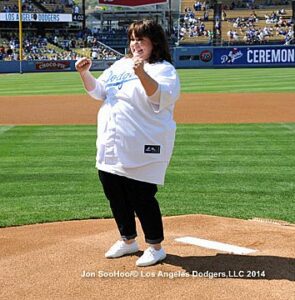 Actress Melissa McCarthy reacts to her pitch at Dodger Stadium June 28, 2014