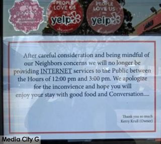 Photo: FLLewis / Media City G -- Sign on the front of Romancing the Bean in Magnolia Park restrictiing Internet use October 11, 2014