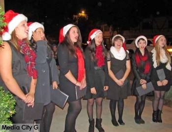 Photo: FLLewis / Media City G -- John Burroughs High School carolers entertained crowds with Christmas songs in front of the Enchanted Florist at 850 North Hollywood Way during Holiday In the Park November 21, 2014