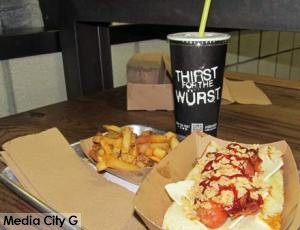 Photo: FLLewis / Media City G -- "The Cowboy Dog" with smoked bacon, onions, BBQ sauce, and white American cheese at the Dog Haus in Burbank November 22, 2014