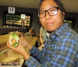 Photo: FLLewis / Media City G -- Customer shows off veggie dog at Dog Haus in Burbank November 22, 2014
