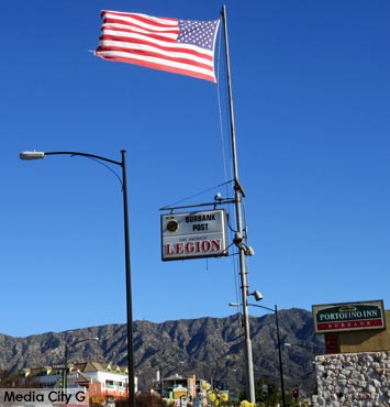 Photo: FLLewis / Media City G -- Strong winds whipped around the flag out front of the American Legion Post No.150 at 940 West Olive Avenue Burbank  January 24, 2015