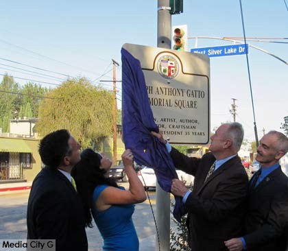 Photo: FLLewis / Media City G -- (l-r) Los Angeles Councilman Joe Buscaino, Marianna Gatto, Los Angeles Councilman Tom LaBonge, Los Angeles Councilman Mitch O'Farrell -- The "Joseph Anthony Gatto Memorial Square" sign unveiled today at West Silver Lake Drive and Rowena Avenue in Silver Lake June 19, 2015