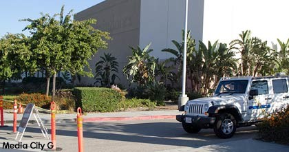 Photo: Greg Reyna/ Media city G -- Entrance to parking lot next to the old Great Indoors building at 1300 North Victory Place blocked off with Burbank Police on guard Burbank June 16, 2015